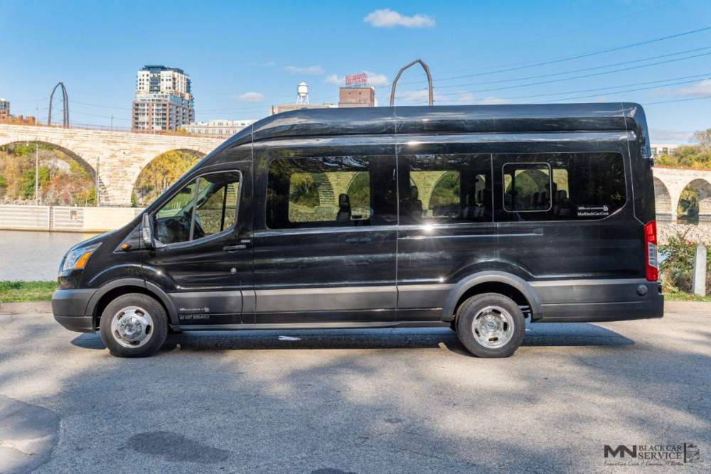 MN Black Car 14 passenger shuttle van, side view