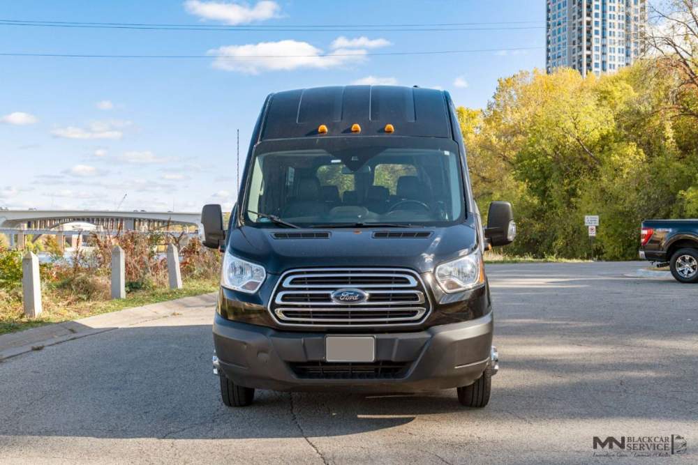 MN Black Car 14 passenger shuttle van, front view