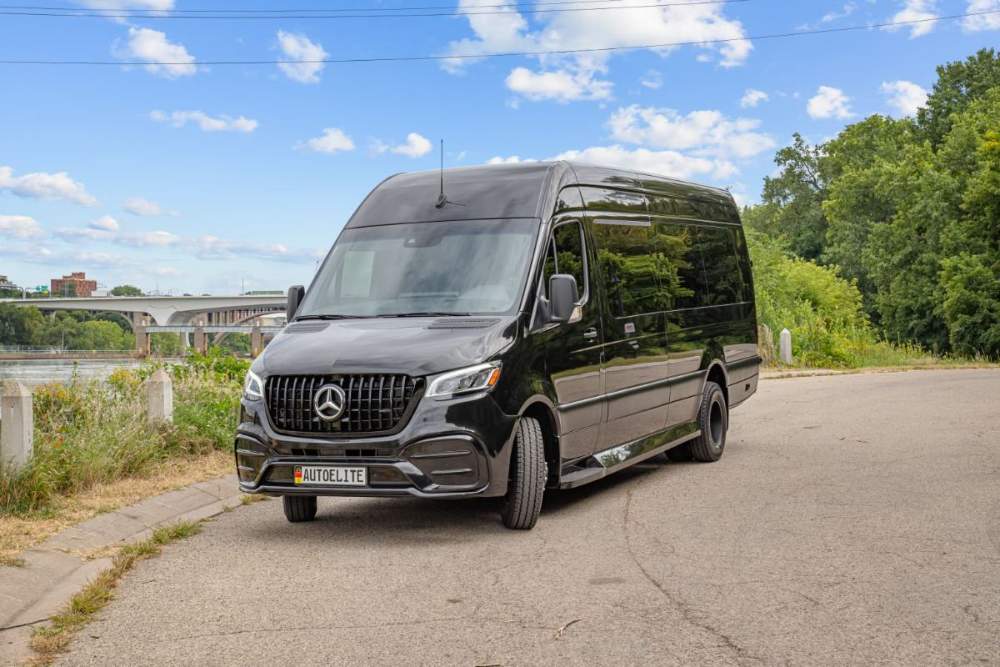 MN Black Car Mercedes-Benz Sprinter executive van, riverside view