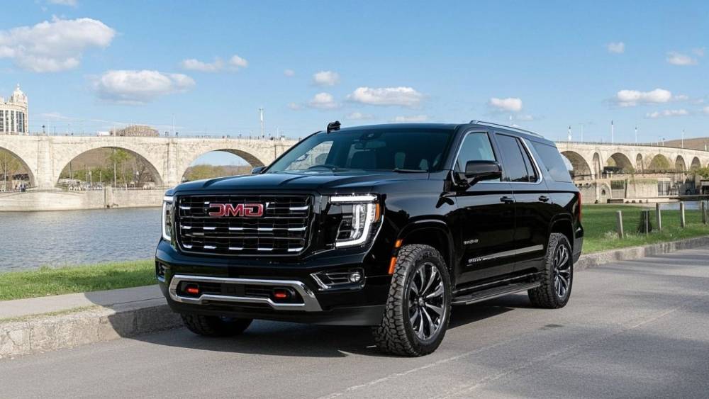 MN Black Car GMC Yukon SUV, Stone Arch Bridge