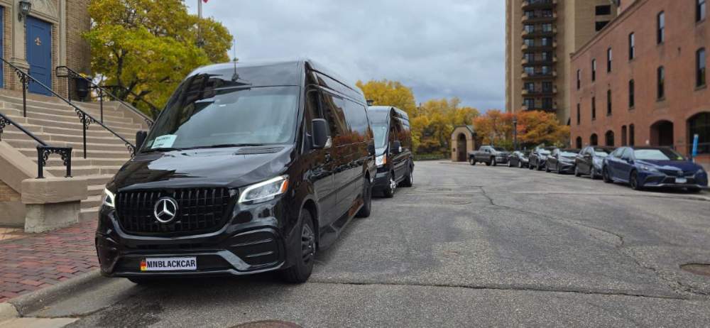 MN Black Car point to point transportation vehicle, view 1