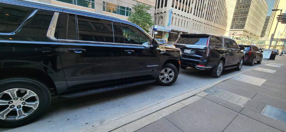 MN Black Car point to point transportation vehicle, view 3